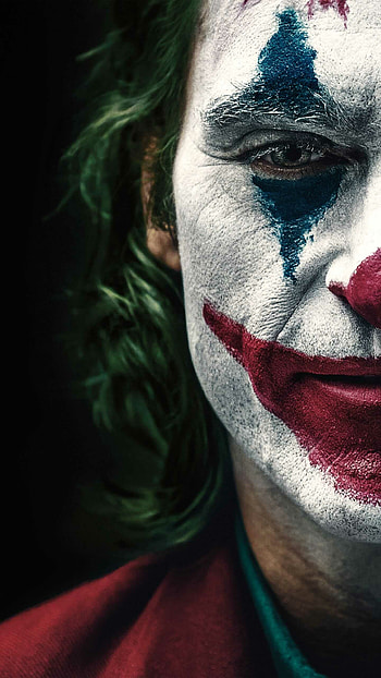 Joker, Provocative portrayal, Unflinching storytelling, Intense character study HD phone wallpaper