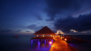 night lights Maldives tropical beach bungalow ocean sea sunset reflection background HD wallpaper