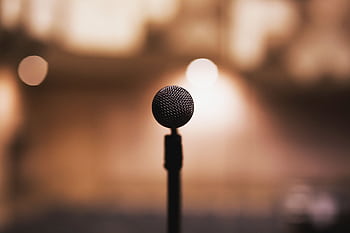 Micro on stand with blurred background, ideal for music or speech themes. HD wallpaper