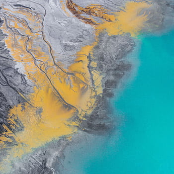 Stunning aerial shot of colorful land and water patterns, creating a surreal abstract landscape. HD phone wallpaper