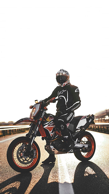 Supermoto motorcycle, Motorsport dynamics, Racing helmet, Extreme adrenaline HD phone wallpaper