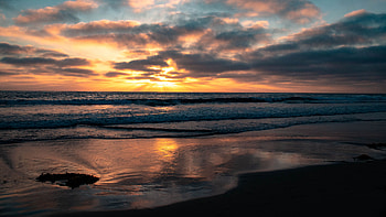 Beautiful Ocean View Sea Waves Beach Sand Under Black Clouds Blue Sky During Sunset Nature HD wallpaper