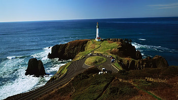 Lighthouse background, Coastal scenery, Captivating view, Serene ambiance HD wallpaper