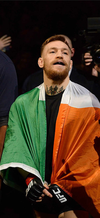 Conor McGregor, Wptunnel , Ferocious fighter, Iconic stance HD phone wallpaper
