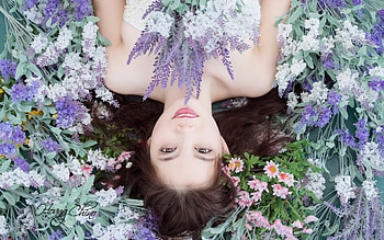 Lying on a bed of flowers, dreamer, lavander, field of flowers, girl, beauty HD wallpaper