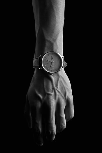 Black and white showcasing a wristwatch on a man's hand, emphasizing veins and minimalism. HD phone wallpaper