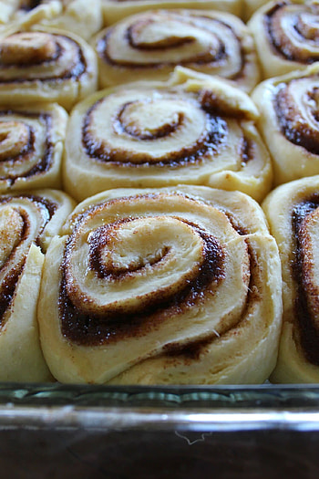 Signature Cinnabon cinnamon rolls, Delectable homemade treat, Cinnamon roll perfection, Oven-baked goodness HD phone wallpaper
