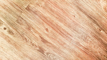 Close-up of a rustic wooden texture with detailed grain patterns, perfect for backgrounds. HD wallpaper