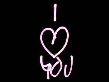 Bright pink light painting of 'I Love You' on a black background, perfect for Valentine's Day. HD wallpaper