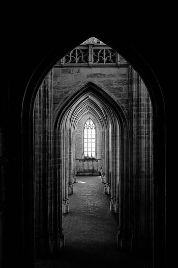 Dramatic black and white of a gothic archway with intricate architectural details. HD phone wallpaper