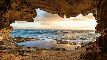 Sea Cave on Kauai, coast, clouds, sky, rocks, usa, stones HD wallpaper