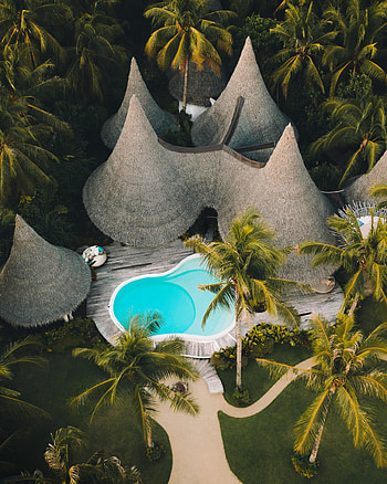 Resort huts, pool, aerial shot HD phone wallpaper