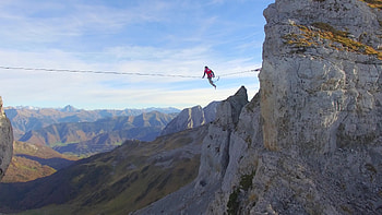 Aerial view of slacklining in the mountains, Fearless balance, Acrobatic display, Majestic scenery HD wallpaper