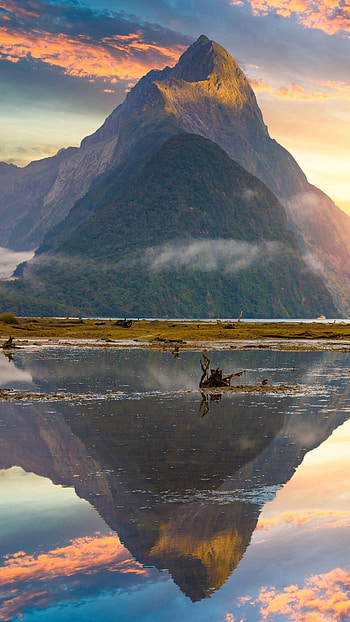 Mitre Peak rising from the Milford Sound Fiord, Fiordland National Park HD phone wallpaper