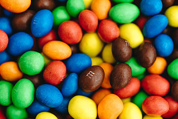 Peanut M&M's. Chocolaty goodness, Nutty flavor, Deliciously satisfying HD wallpaper