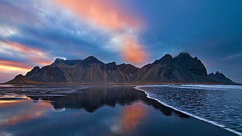 Waves roll in on a black sand beach beneath a midnight sunset, Vestrahorn, Iceland, sea, clouds, colors, landscape, sky, mountain HD wallpaper