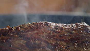 Falling herbs, Seasoning ritual, Flavorful pork, Culinary delight HD wallpaper