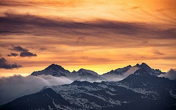 Beautiful sunset, mountains, horizon, yellow sky HD wallpaper