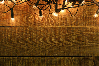 New year garland, Wooden wall background, Christmas ambiance, Reflective shine HD wallpaper