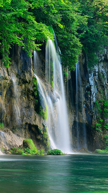 Waterfall beauty, wonder, Captivating view, Nature's masterpiece HD phone wallpaper