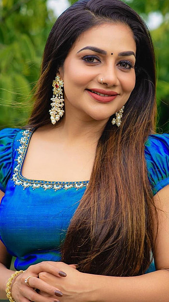 Rimi Tomy, mallu actress, singer HD phone wallpaper