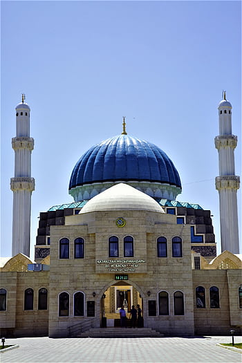 Stunning view of a grand mosque with a blue dome in Türkistan, perfect for travel and architecture enthusiasts. HD phone wallpaper
