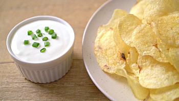 Potato chips, Sour cream dipping sauce, Tempting treat, Stock video HD wallpaper