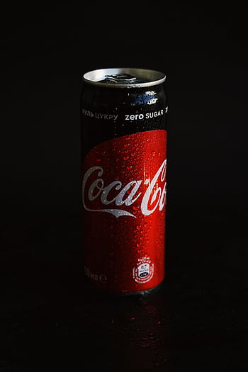 Close-up shot of a cold Coca-Cola Zero Sugar can with condensation in a dark setting. HD phone wallpaper