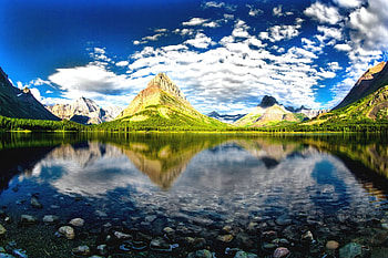 The Skies Of Swiftcurrent Lake, Montana, reflection, crystal waters, Glacier National Park, clouds, beautiful, mountains, forest HD wallpaper