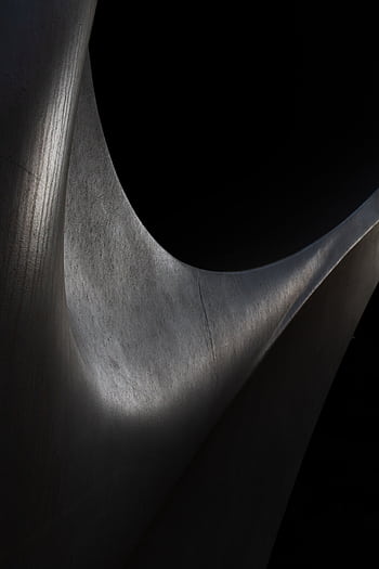 Explore the intricate play of light and shadow on metal curves in this abstract art piece. HD phone wallpaper