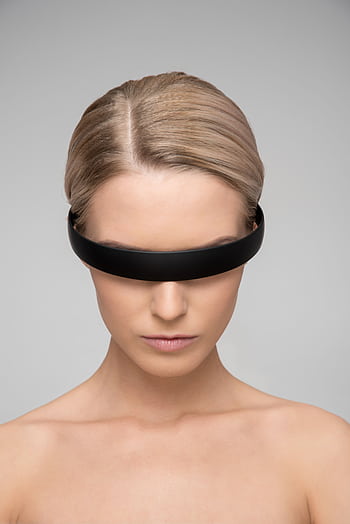 A captivating portrait of a woman with a sleek VR headset, depicting a futuristic theme. HD phone wallpaper