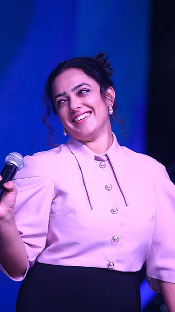 Nithya Menon, multilingual actress HD phone wallpaper