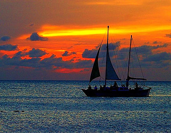 Sails in the sunset, orange and red sky, ripples on water, sailboat, sunset, evening HD wallpaper