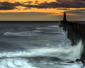 Lighthouse and Evening Waves, sea, lighthouse, waves, clouds, Nature, water, sunset HD wallpaper
