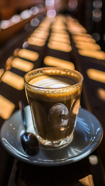 Glass coffee light, Reflective surfaces, Cafe ambiance, Illuminated atmosphere HD phone wallpaper