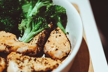 Close-up of a healthy homemade chicken and broccoli dish, perfect for a nutritious meal. HD wallpaper