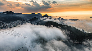 rio de janeiro covered by clouds at sunrise, cable cars, city, clouds, mountains, sunrise HD wallpaper