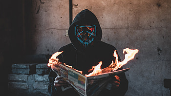Mask Guy Reading A Burning News Paper HD wallpaper