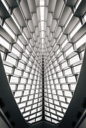 Modern architectural design with geometric patterns inside Milwaukee Art Museum. HD phone wallpaper