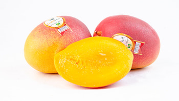 Imported mangoes, Exotic fruit, Tropical flavor, Juicy and delicious HD wallpaper