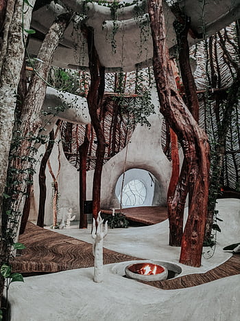 An artistic indoor space featuring natural wood beams and minimalist design elements. HD phone wallpaper