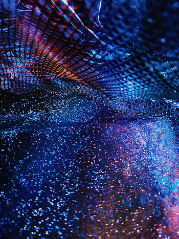 A mesmerizing abstract featuring colorful shimmering glitter under a cosmic pattern, evoking mystery and elegance. HD phone wallpaper