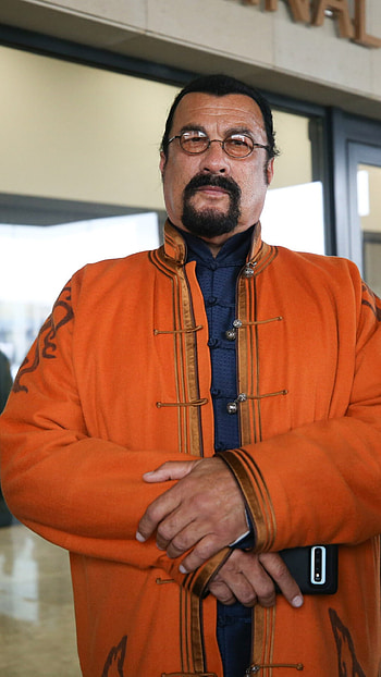 Steven Seagal, Versatile actor, Multifaceted career, Successful filmography HD phone wallpaper