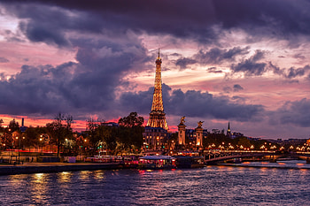 Eiffel tower, night, city, Paris, clouds HD wallpaper