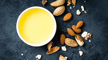 Almond oil skincare, Hair growth benefits, Vogue India recommendation, Beauty care essentials HD wallpaper