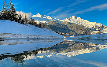 Settled silt patterns in a glacial fed stream - Juneau, Alaska, river, reflection, snow, trees, sky, water, mountains, ice, usa HD wallpaper
