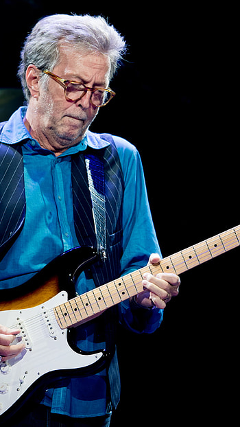 Eric Clapton, Emotional resonance, Captivating performances, Musical artistry HD phone wallpaper