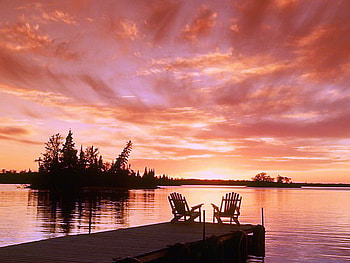 Evening show, chairs, trees, sky, dock, lake, reflections, evening, coral clouds HD wallpaper