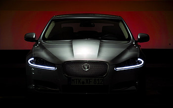 Jaguar Logo, Shiny car, Powerful emblem, Automotive elegance HD wallpaper