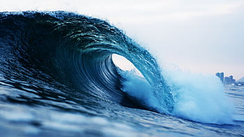 Capturing the energy of a barrel wave crashing on the Chilean coast. HD wallpaper